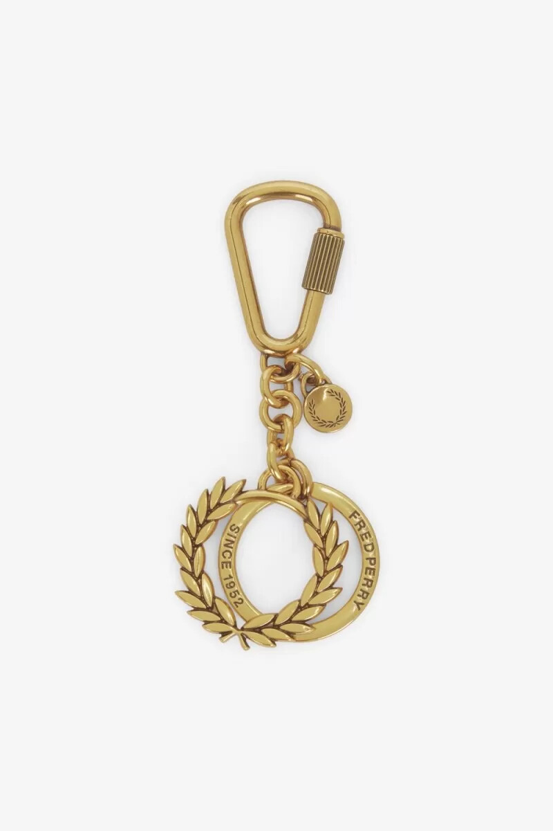 fred perry laurelkransnyckelring dam lifestyle guld