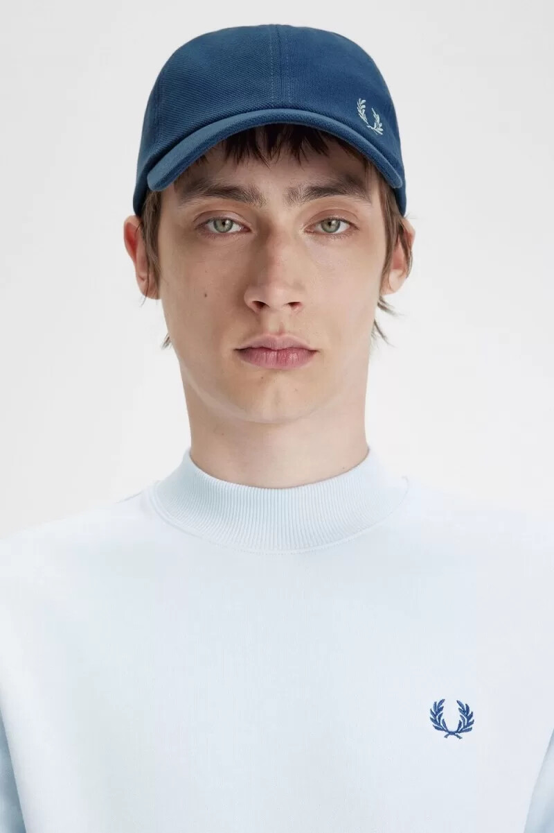 fred perry classic pique herrkeps midnattsblå ljus aqua