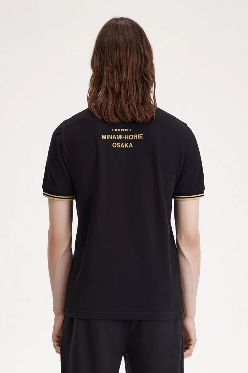fred perry osaka m12 herr pikétröja svart champagne