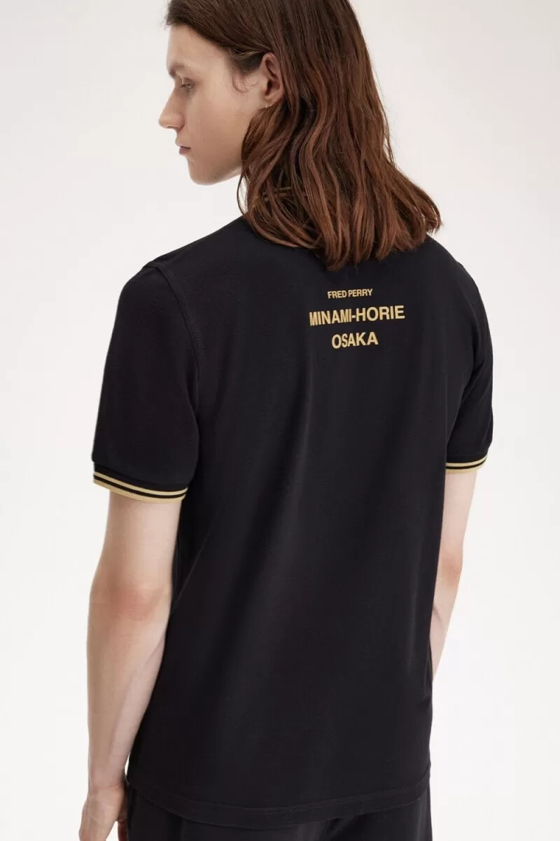 fred perry osaka m12 herr pikétröja svart champagne