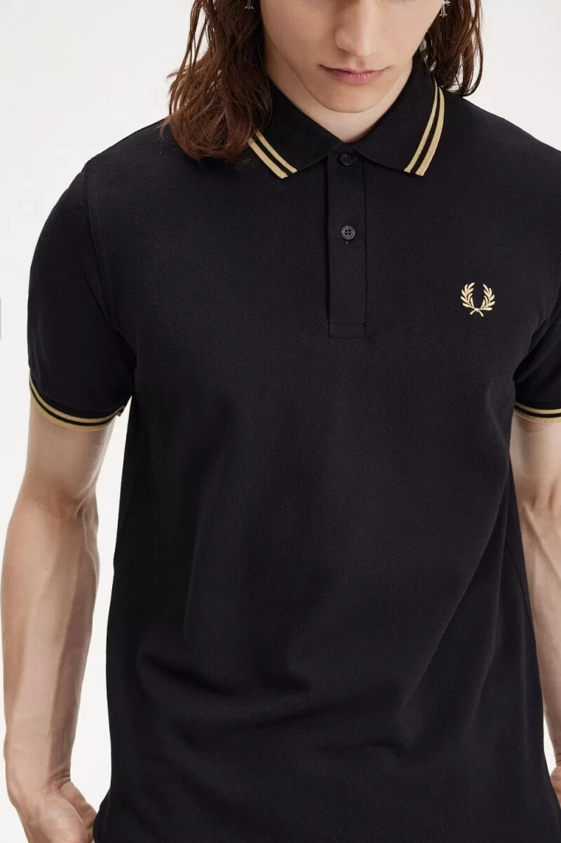fred perry osaka m12 herr pikétröja svart champagne