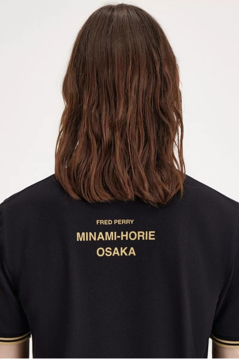 fred perry osaka m12 herr pikétröja svart champagne