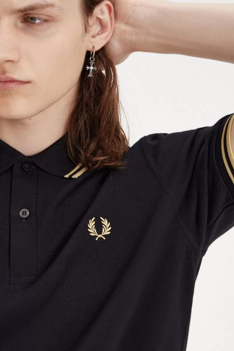 fred perry osaka m12 herr pikétröja svart champagne