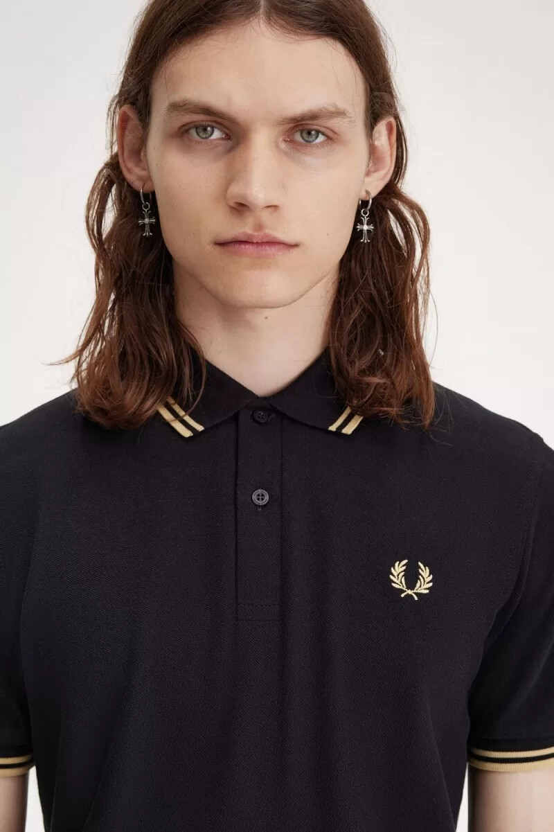fred perry osaka m12 herr pikétröja svart champagne