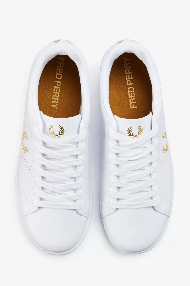 fred perry b721 herr tennisskor vita metalliska guld