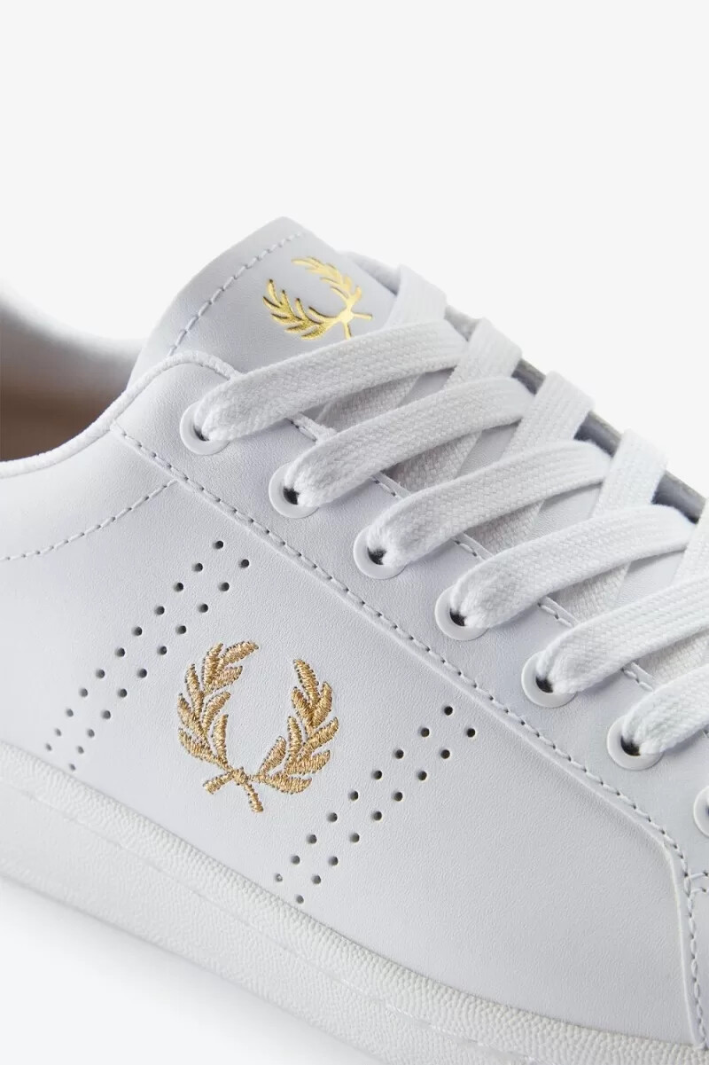 fred perry b721 herr tennisskor vita metalliska guld